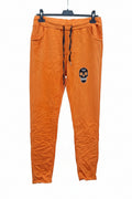 Orange Hose mit Totenkopf-Strass Unikat – La Casa